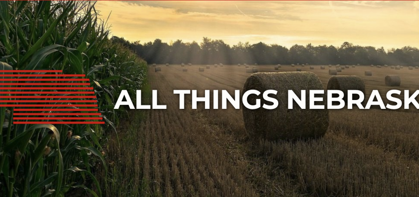 A picture of a hay field with the words, "All Things Nebraska."